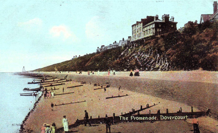 Dovercourt Promenade coloured post card showing sloped cliffs Copyright: William George