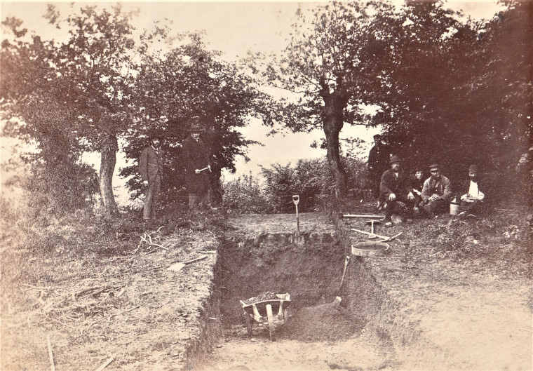 Loughton Camp Excavation 1882 Photograph with wheel barrow Copyright: William George