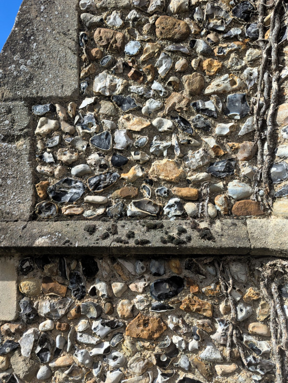 Abbess Roding Church flint wall 17th September 2024 Copyright: William George